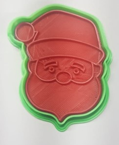 CORTADOR DE GALLETAS DE PLASTICO CON SELLO 6CM CARA SANTA