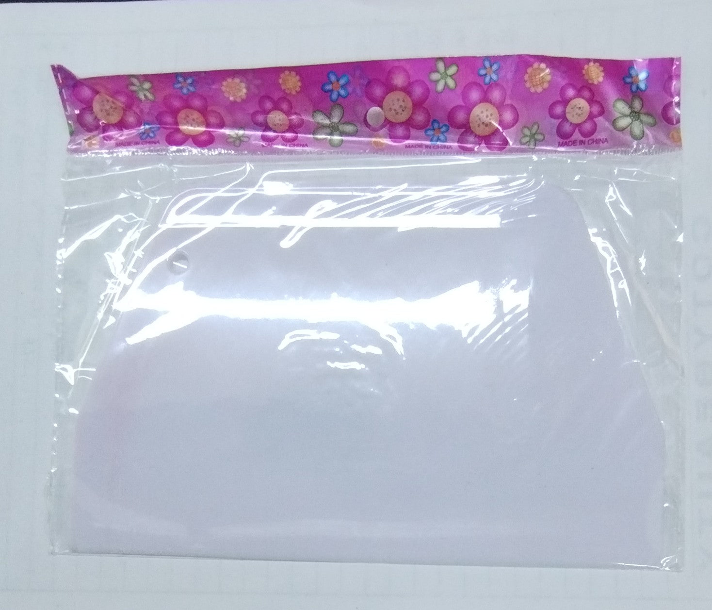 RASPA BLANCA DE PLÁSTICO