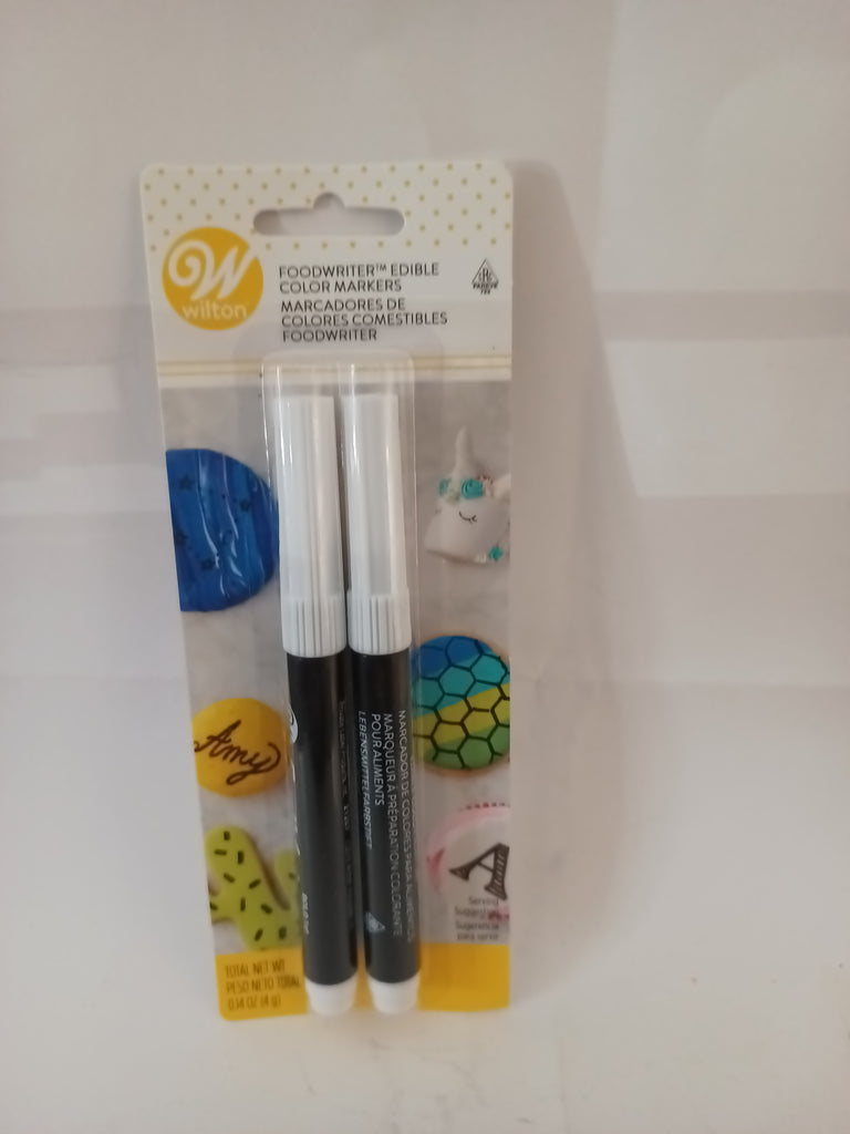 WILTON PLUMON COMESTIBLE PAQUETE  2 PZAS COLOR NEGRO